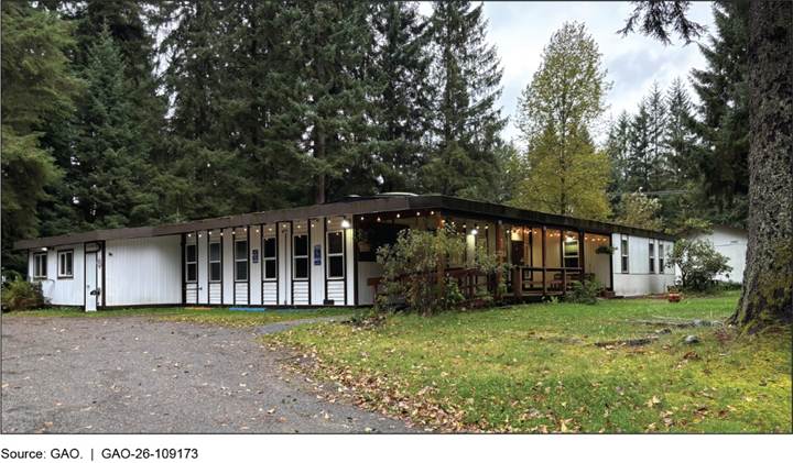 A house with trees around it

AI-generated content may be incorrect.